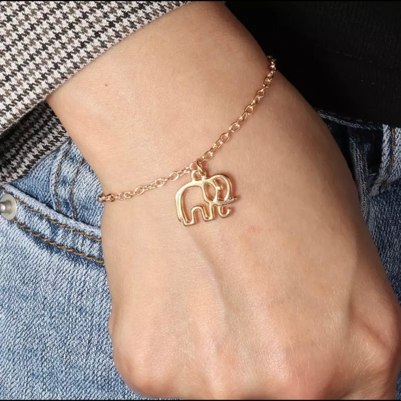 Jewelry - NIP Gold tone lucky elephant bracelet